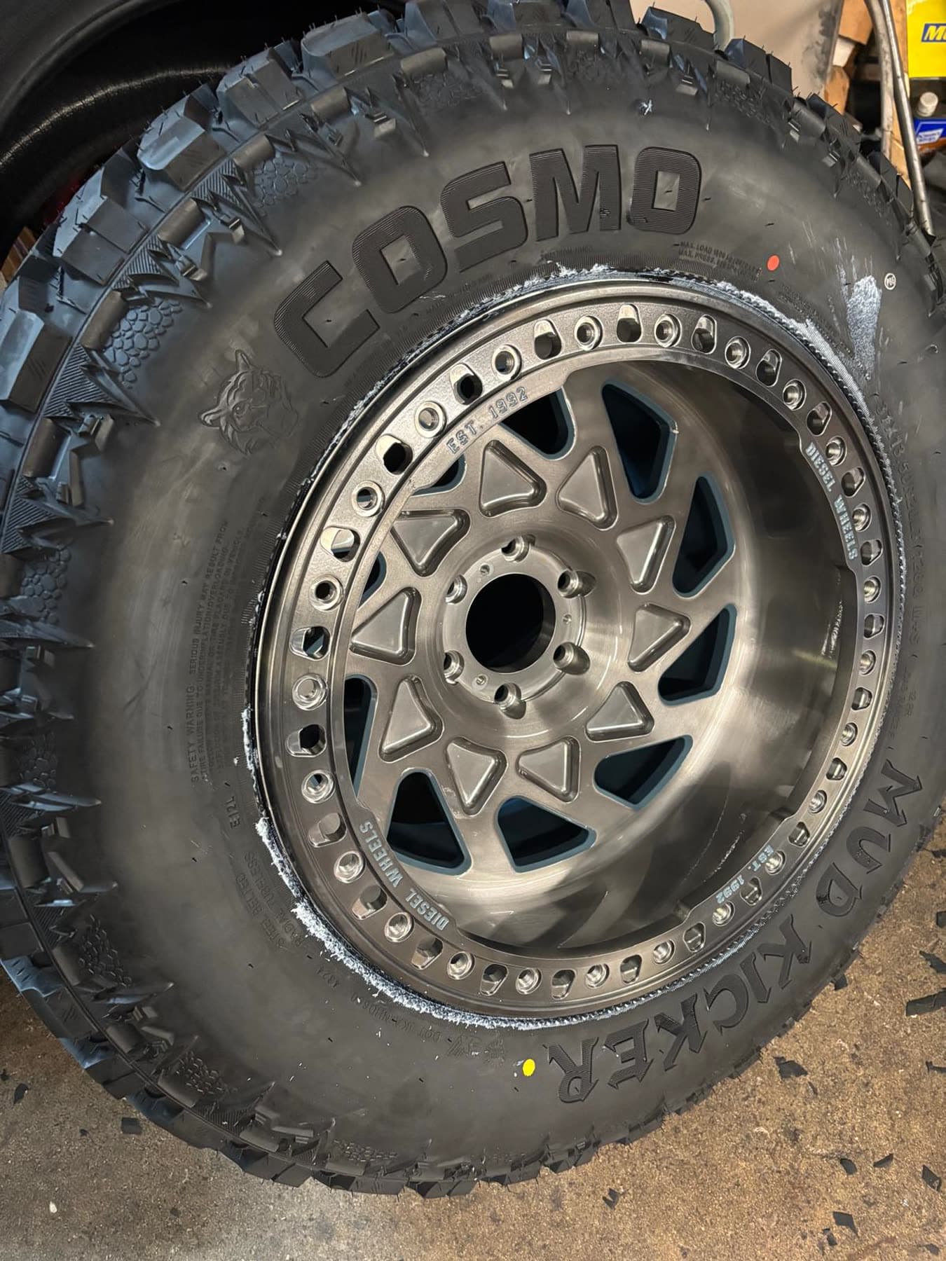 Close-up of a polished forged wheel on an off-road tire