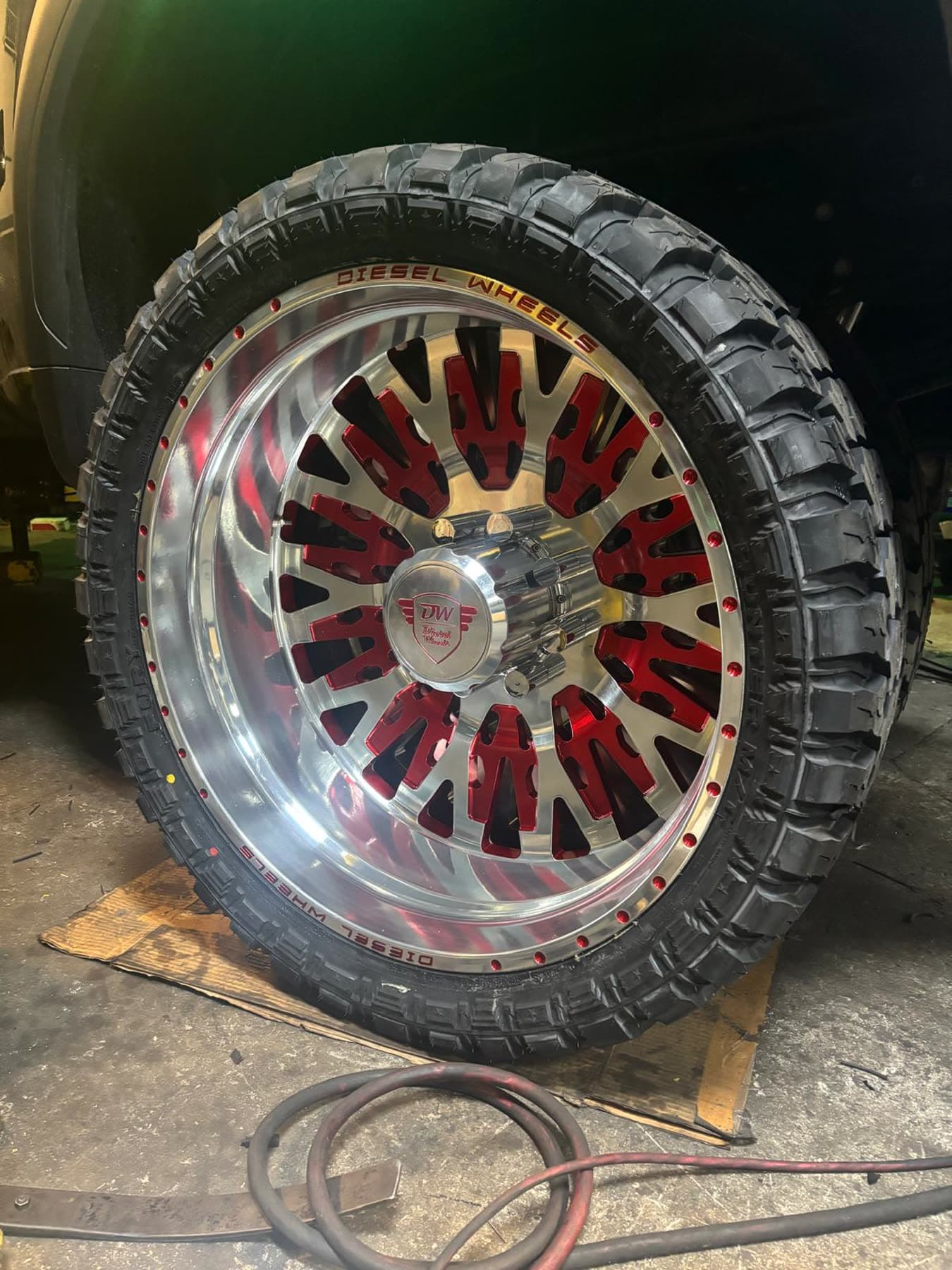 Close-up of a red and polished custom wheel